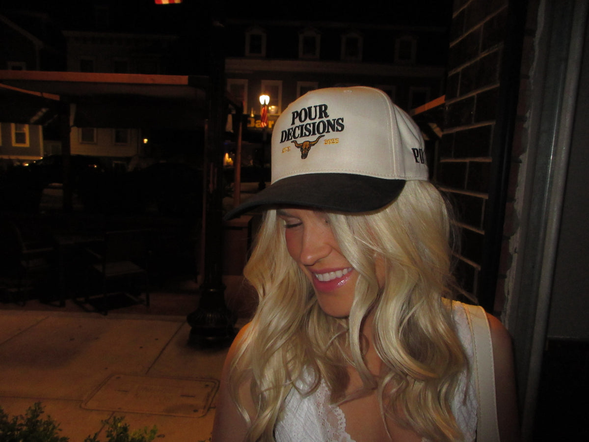 Pour Decisions SnapBack on a summer night, smiling on a porch in Boston